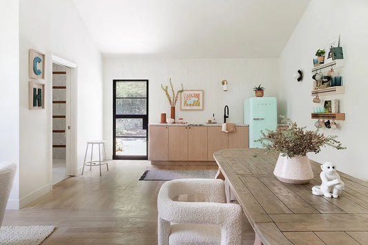 double ironor steel patio door with large glass panels opening into a house hallway