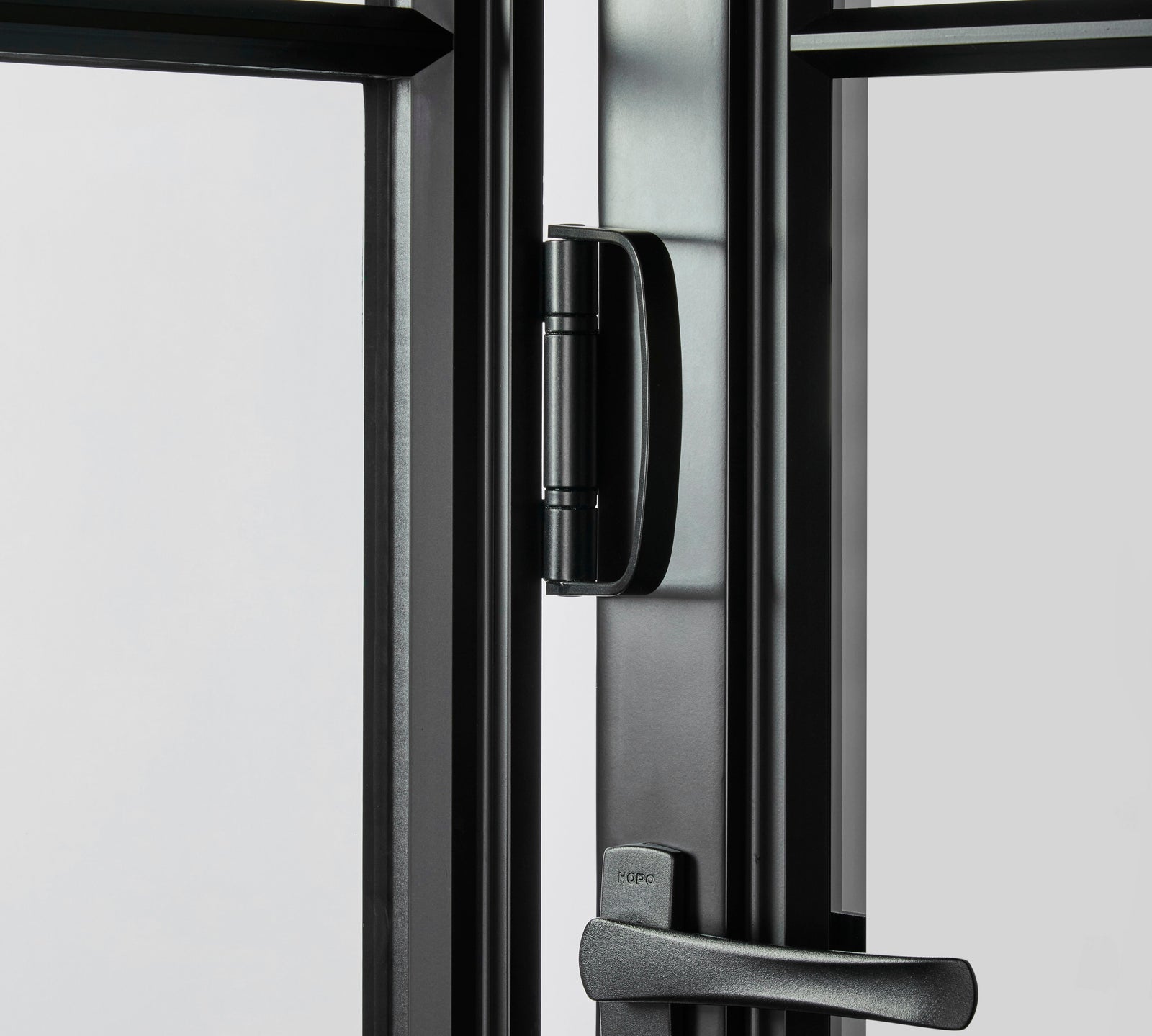 closeup detail of steel bi-fold accordion hardware