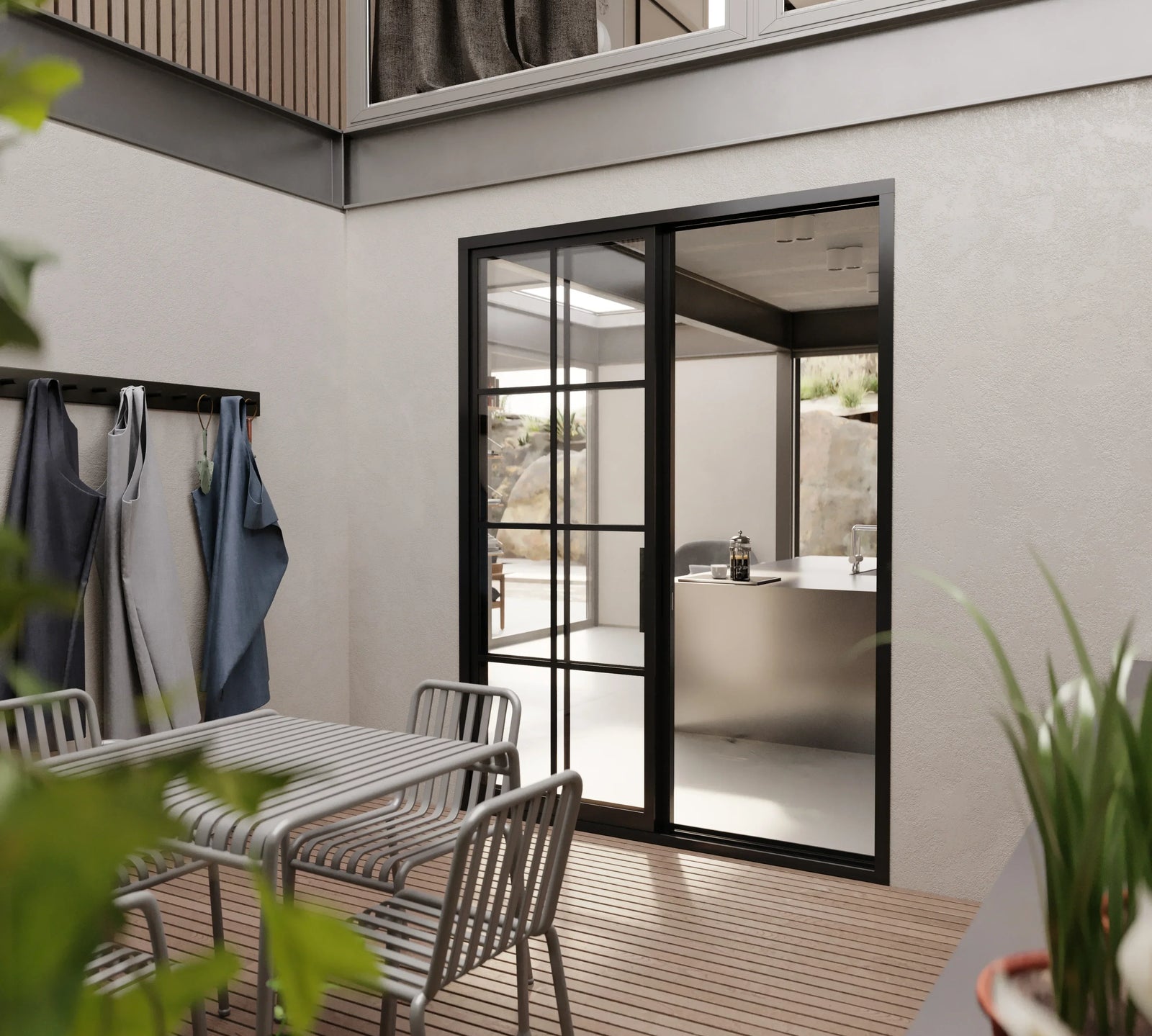 Double steel front door with clear glazing and sleek architectural frame