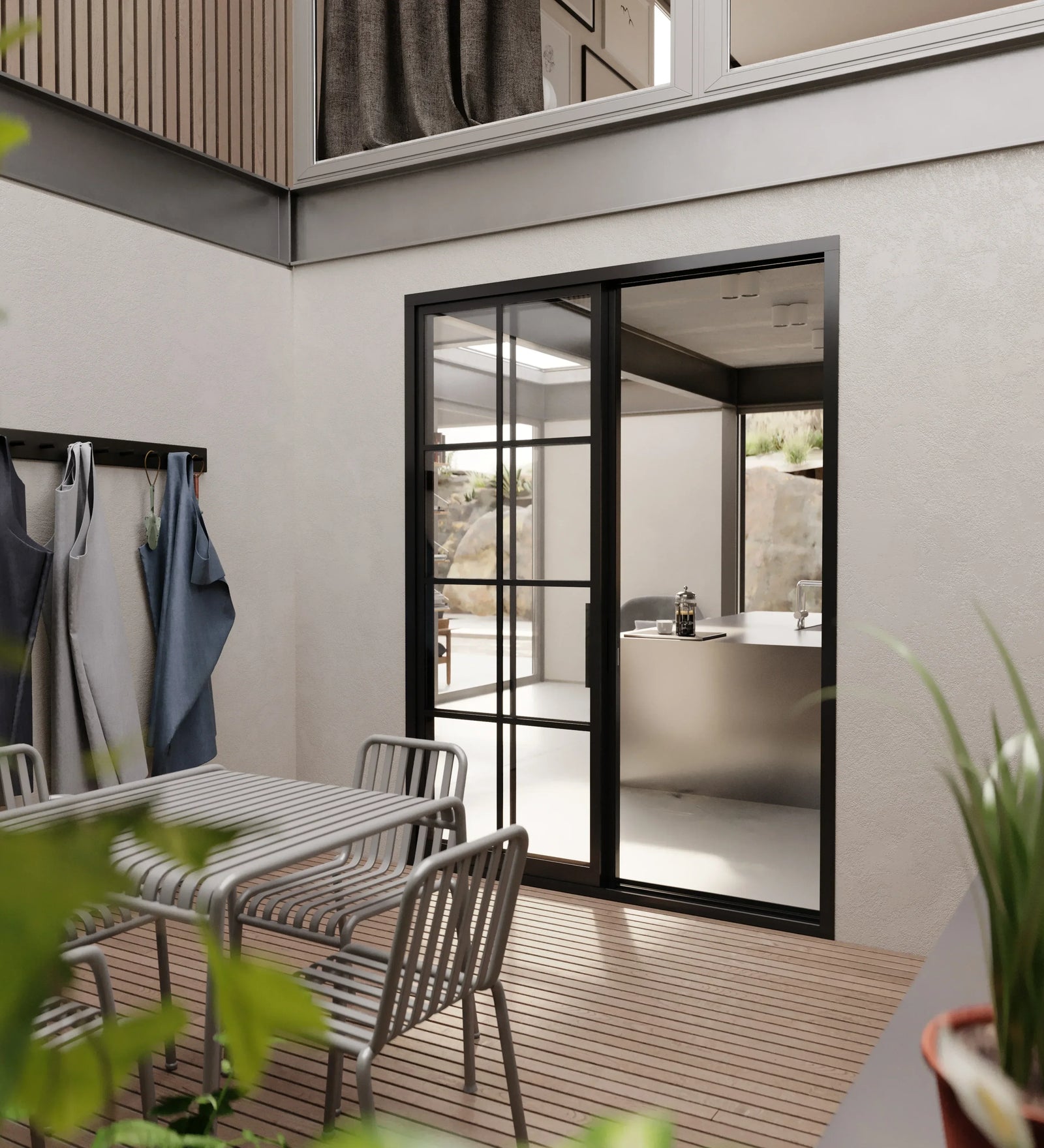 Double steel front door with clear glazing and sleek architectural frame
