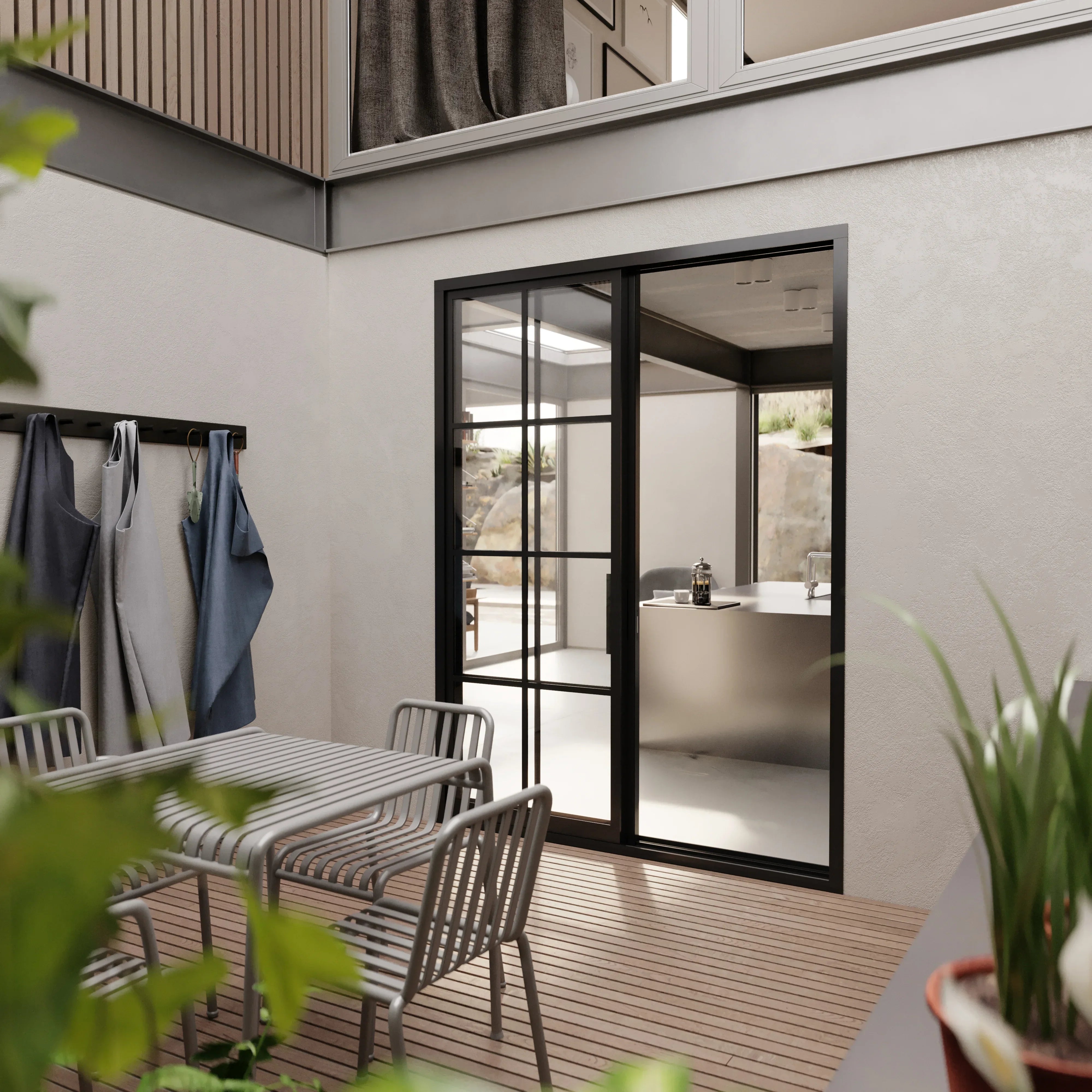 Double steel front door with clear glazing and sleek architectural frame