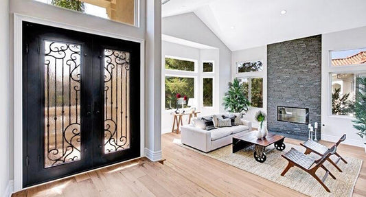 wrought iron doors allowing the people on the inside to look at outside