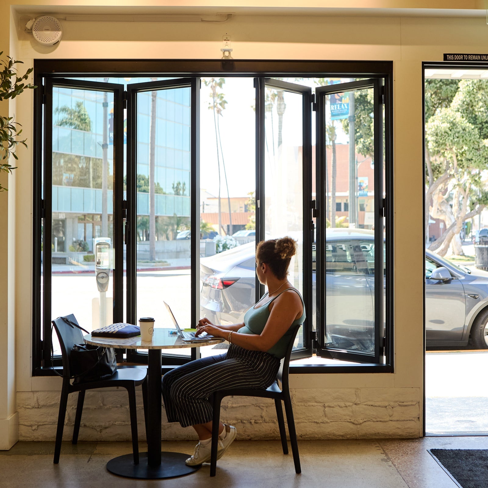 Architectural steel bifold window with narrow sightlines and minimalist design