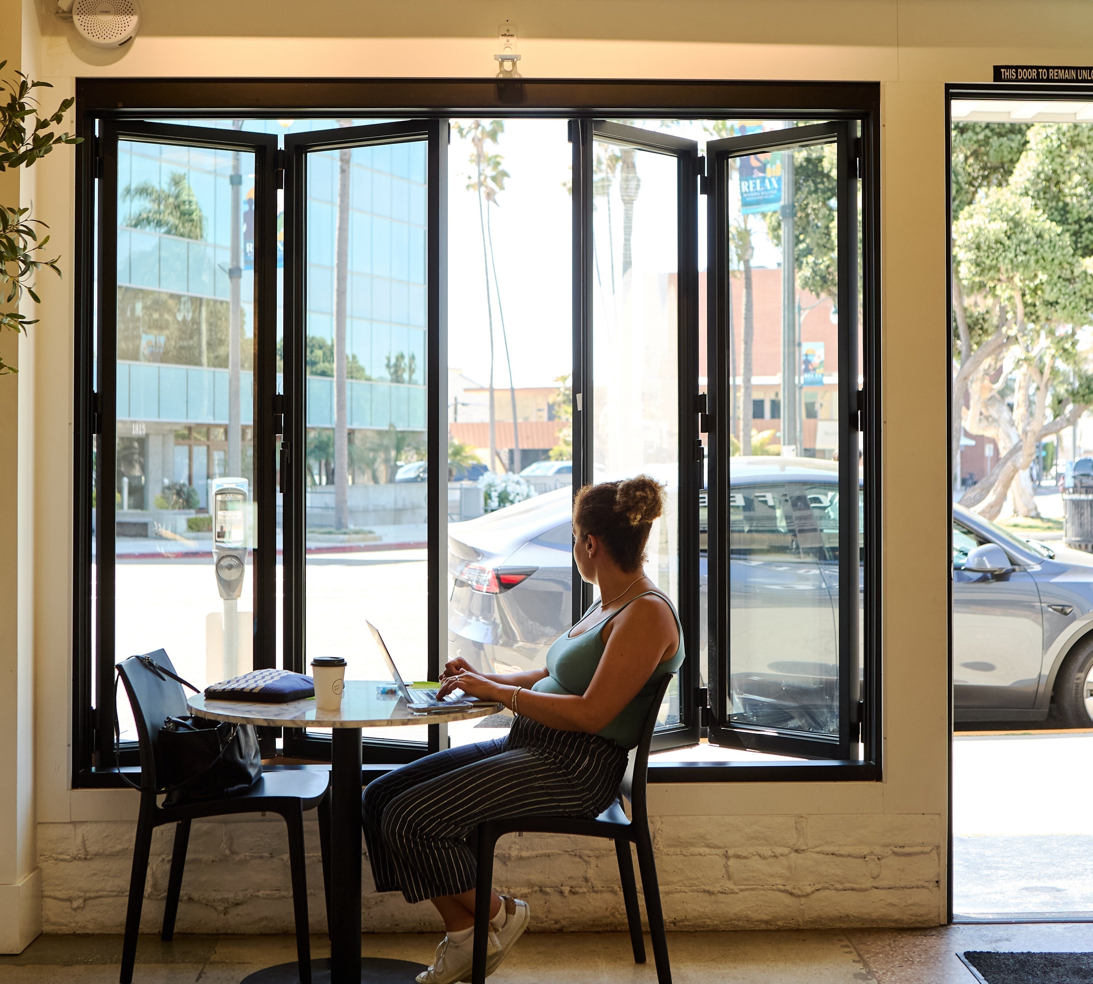 Architectural steel bifold window with narrow sightlines and minimalist design