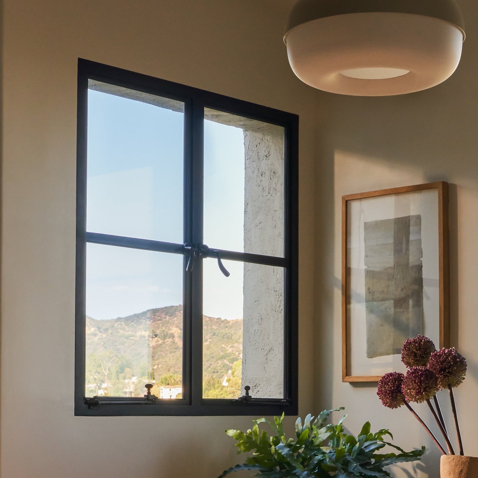 square steel window with expansive glass and slim steel frame
