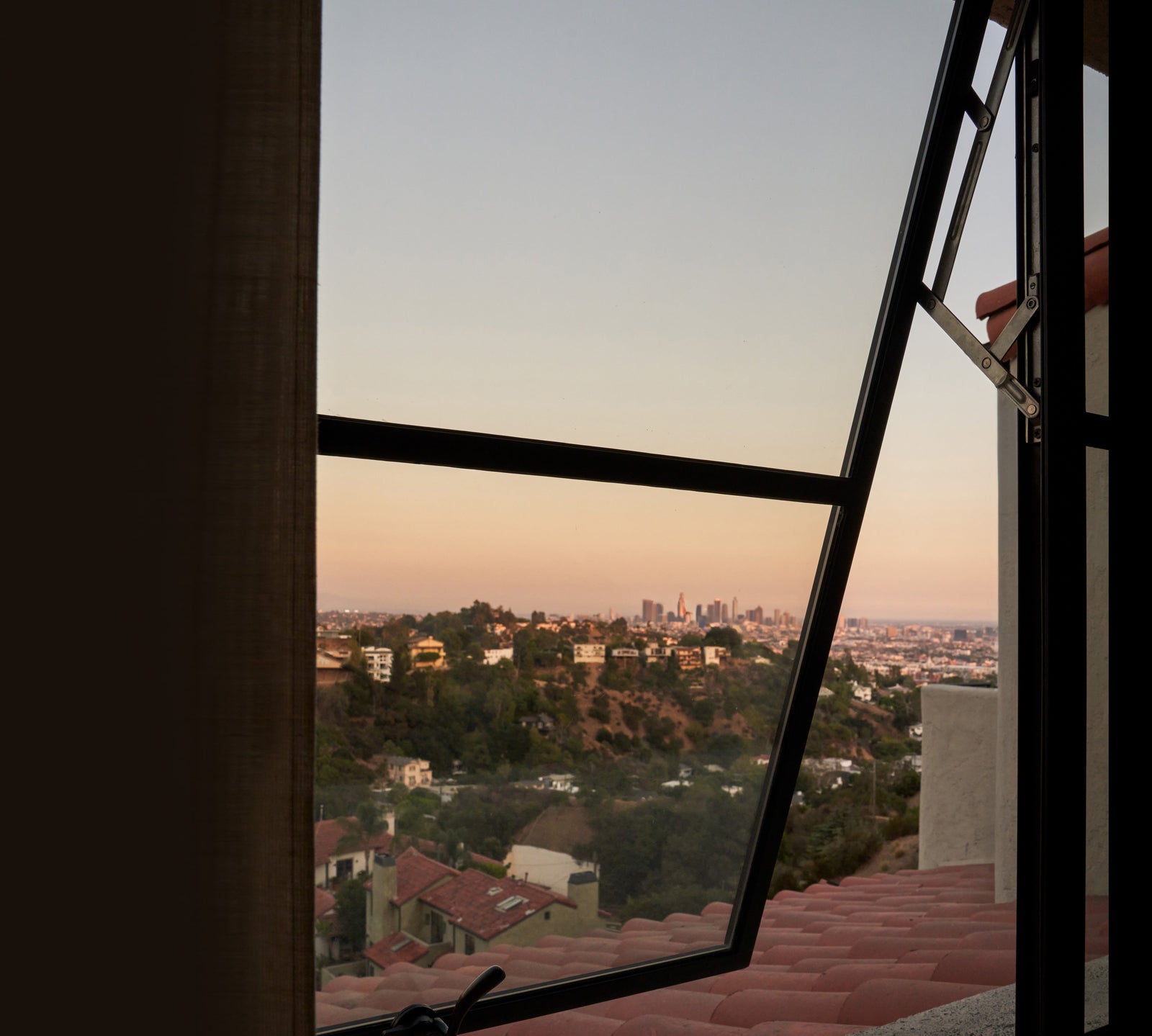 Modern steel awning window with operable glass and slim steel frame