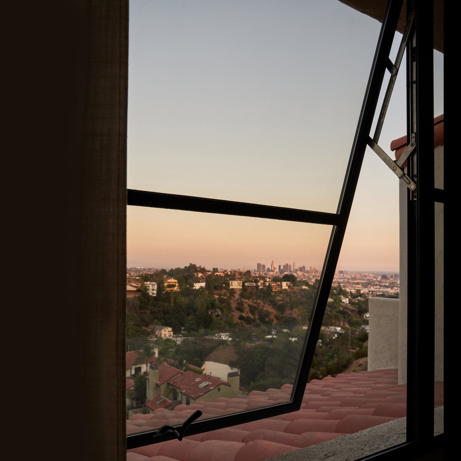 Modern steel awning window with operable glass and slim steel frame