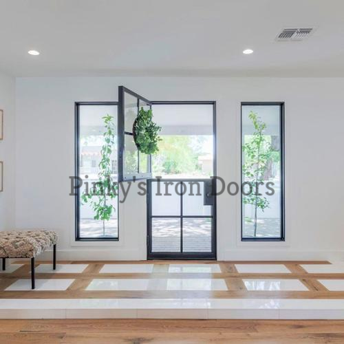 home backyard with ansteel bi-fold door with sidelights.