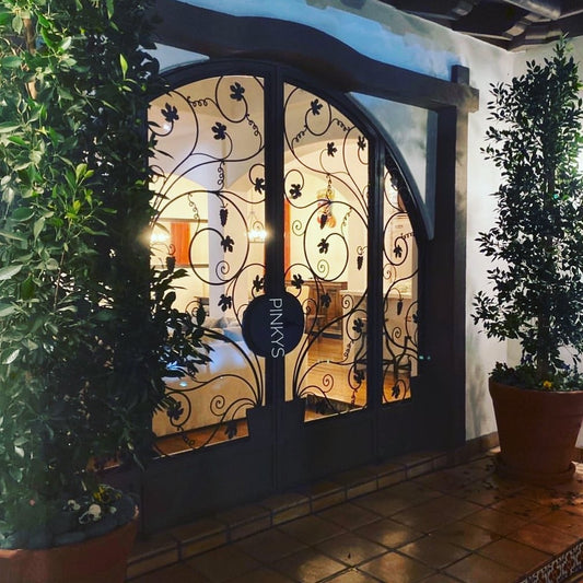 Want to Enhance Property Value with Curb Appeal? Think Iron Doors