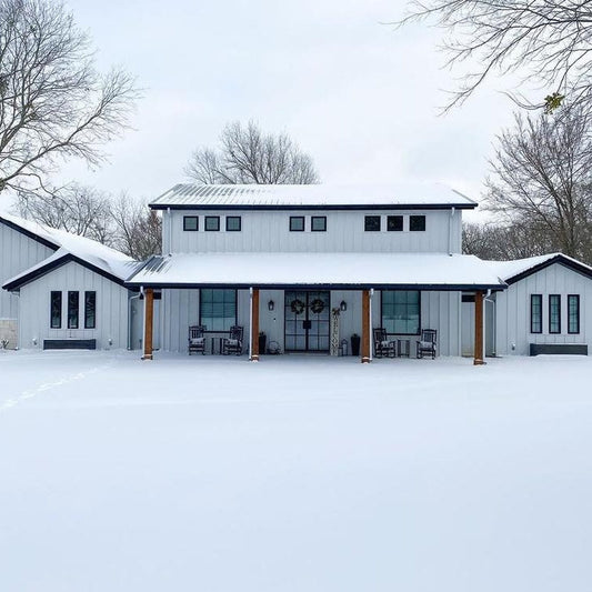 Steel windows and doors on home in snow