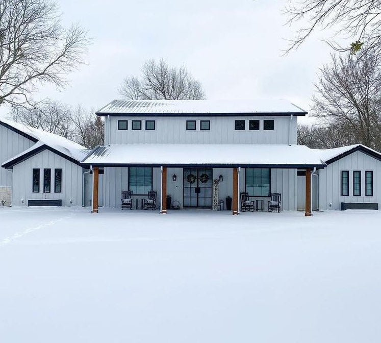 Steel windows and doors on home in snow