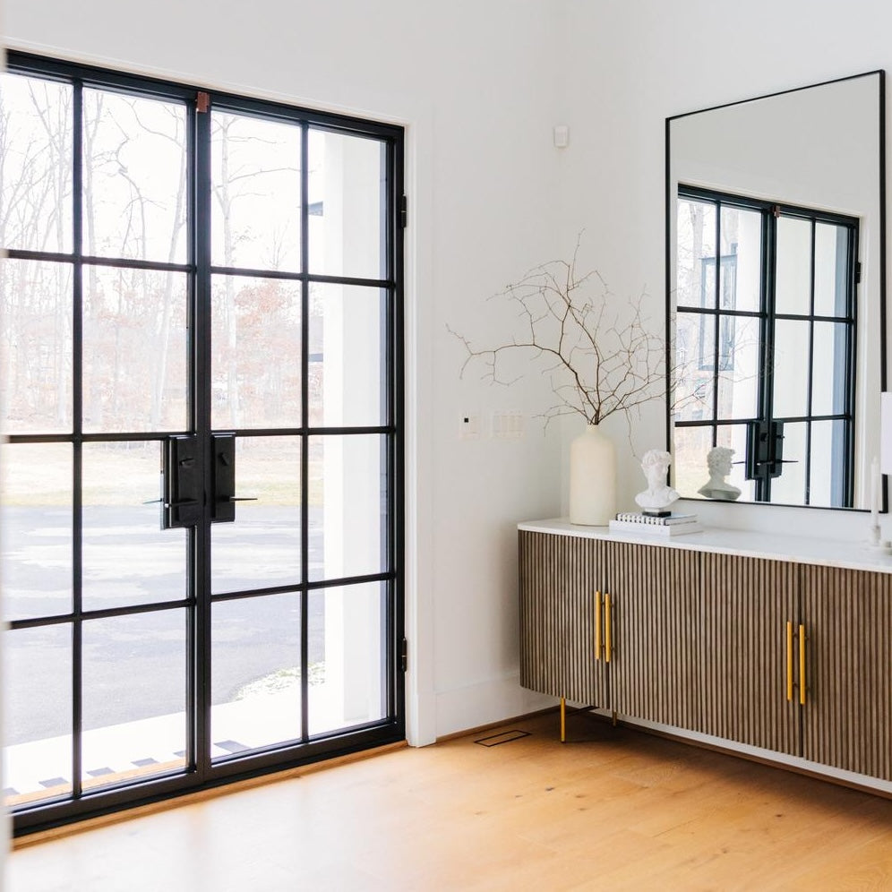 Contemporary double steel door with divided glass panes and minimalist design