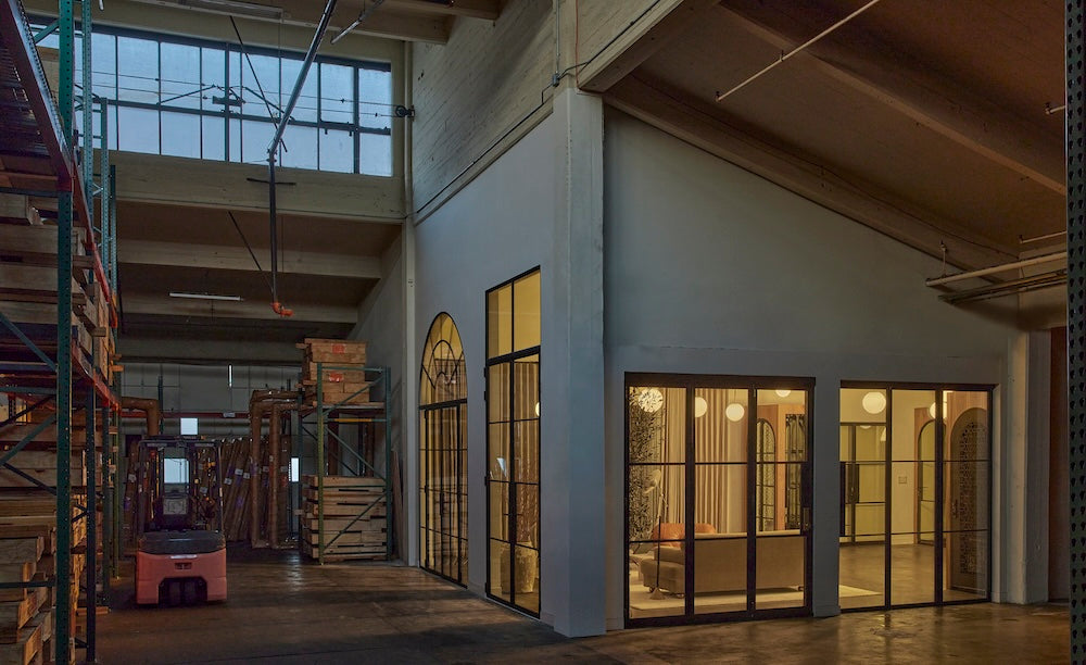 Nighttime interior photo of showroom from PINKYS warehouse