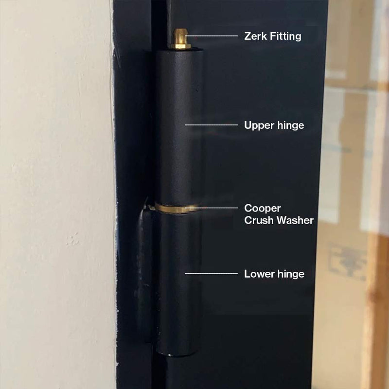 On top of each hinge, you’ll see a Zerk fitting (a brass nipple) that makes greasing your door significantly easier. These fitting do not have caps and are meant to be uncovered.  Made with 12 gauge galvanized steel and 5 mm thick double paned tempered glass with true light divide, our doors are made with top notch materials and are held to a top notch standard. 