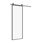 Air Lite sliding barn door featuring sleek steel frame and full-pane glass, clean architectural room divider