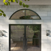 Thermally broken steel arched top glass