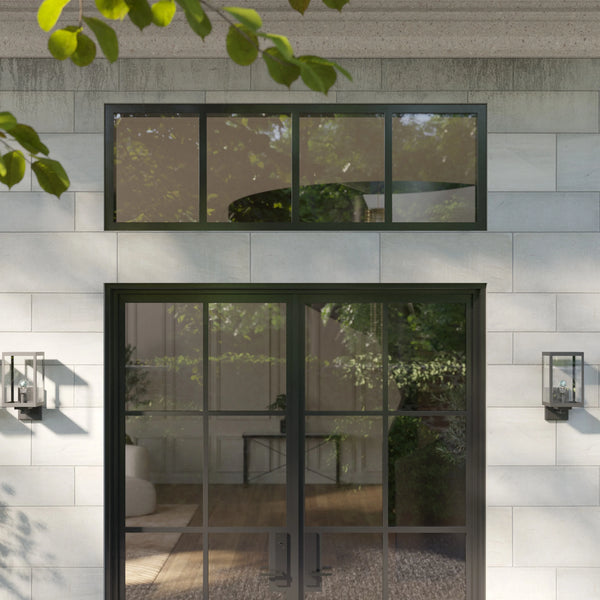 Steel transom window panel with insulated frame construction