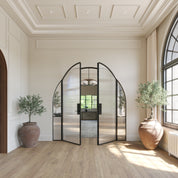 Modern Air Grand interior double steel doors with sidelights and full arch tops in sunset pink, OTTOSTUMM hot-rolled steel framing system