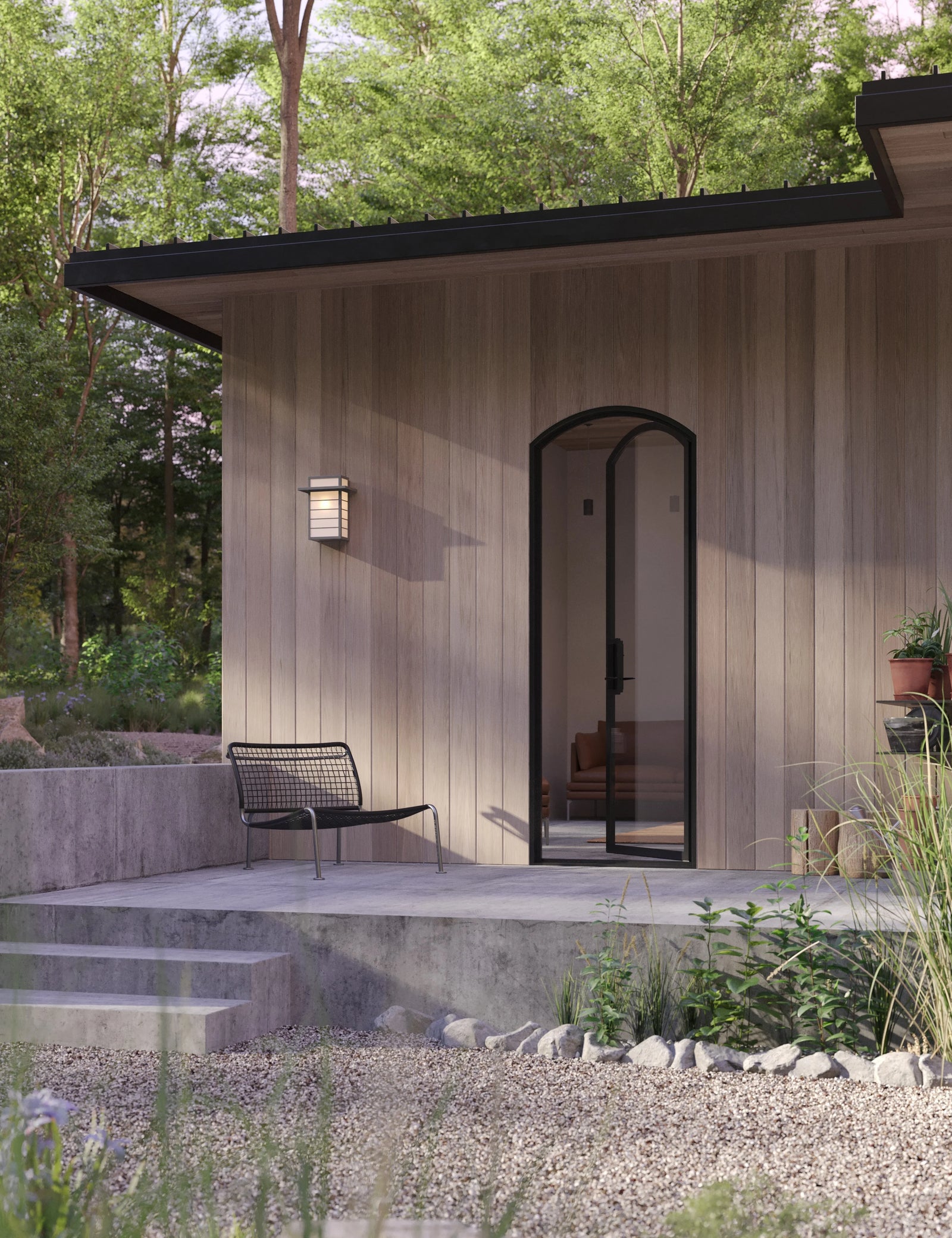 Exterior single arch steel entry with insulated glass.