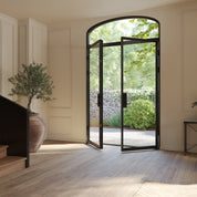 Paired flat steel entry with mini arch top window.