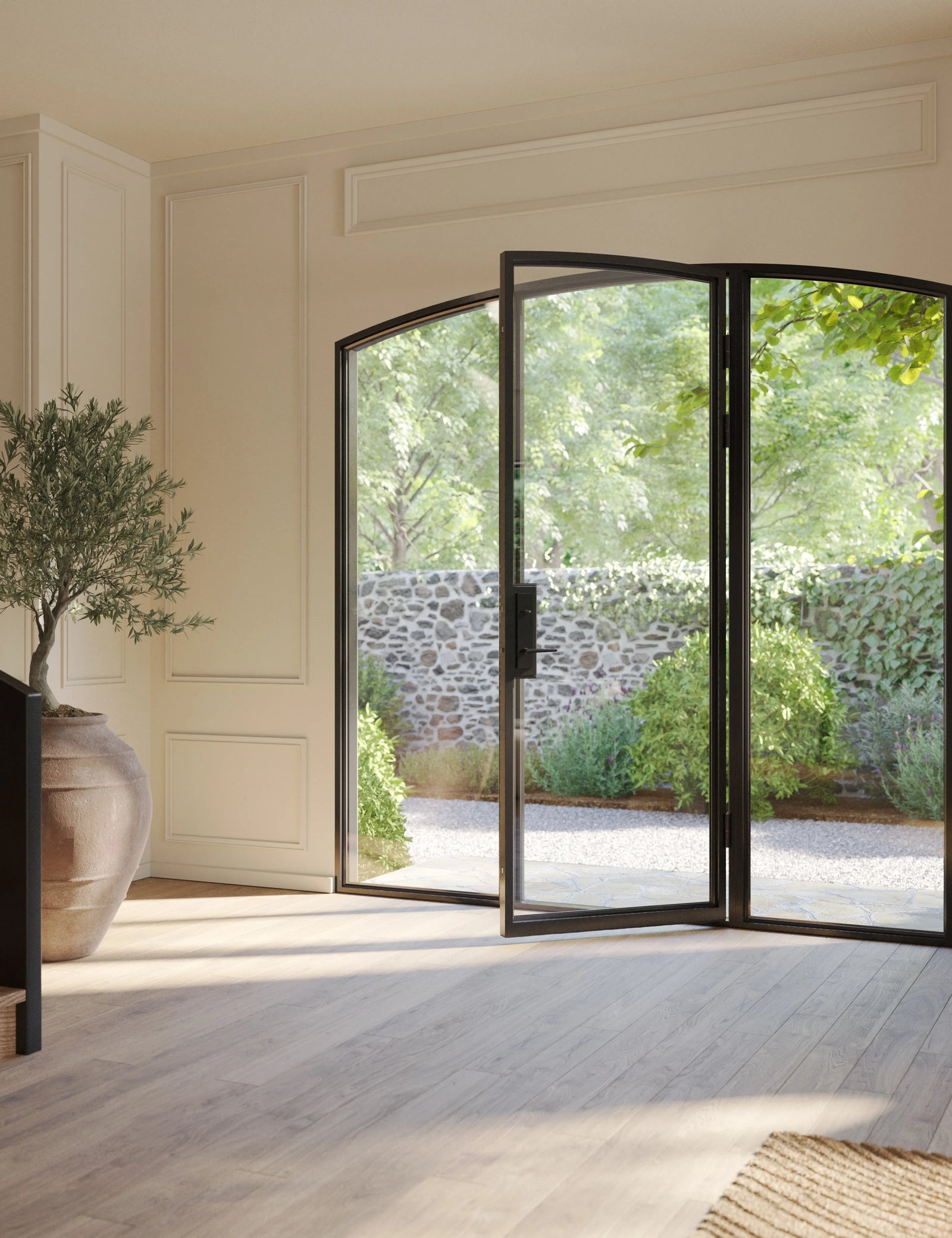 Arched steel entry with side windows and insulated low-E glass.