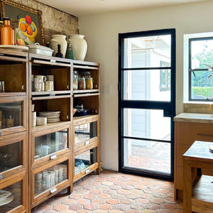 Steel single dutch door in a cozy terra cotta kitchen