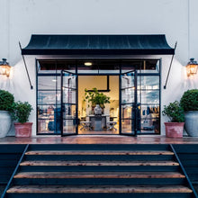 Load image into Gallery viewer, Seattle storefront featuring sleek double steel doors with sidelights and transom
