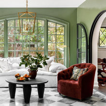 Load image into Gallery viewer, Exotic green family room with tile floors and picture windows and full arch steel interior doors