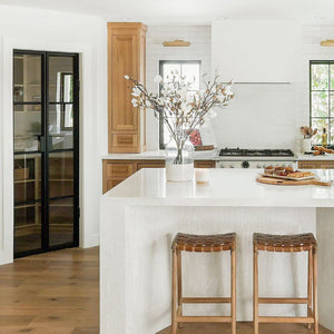 Luxurious black steel and glass pantry doors for a minimalist look.