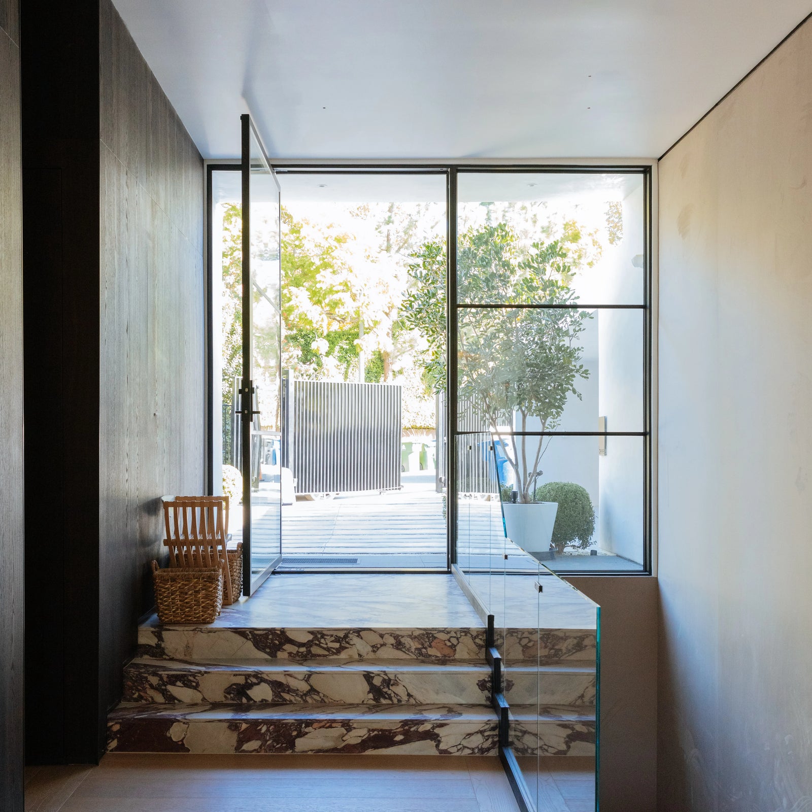 designer modern pivot door with tempered glass