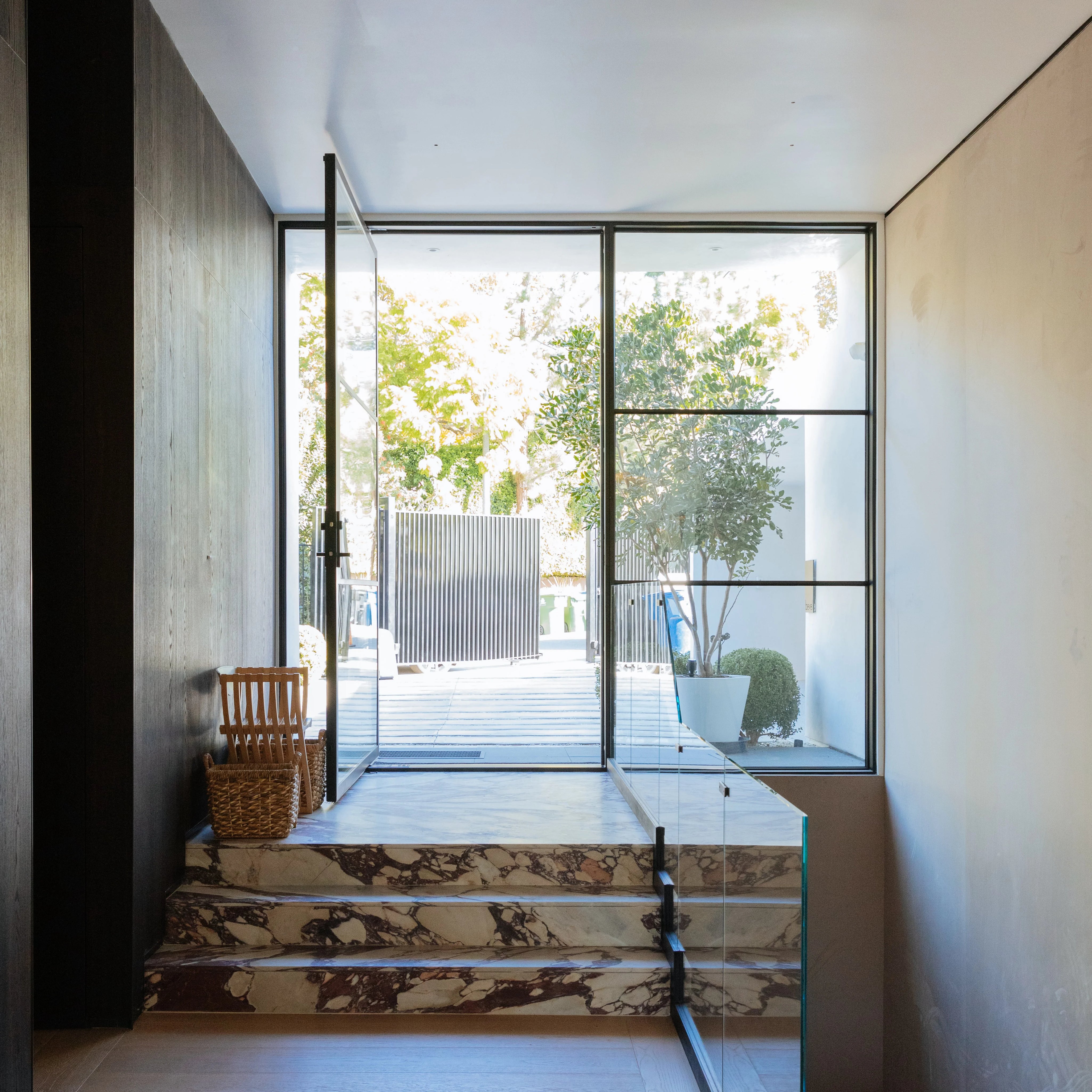 designer modern pivot door with tempered glass