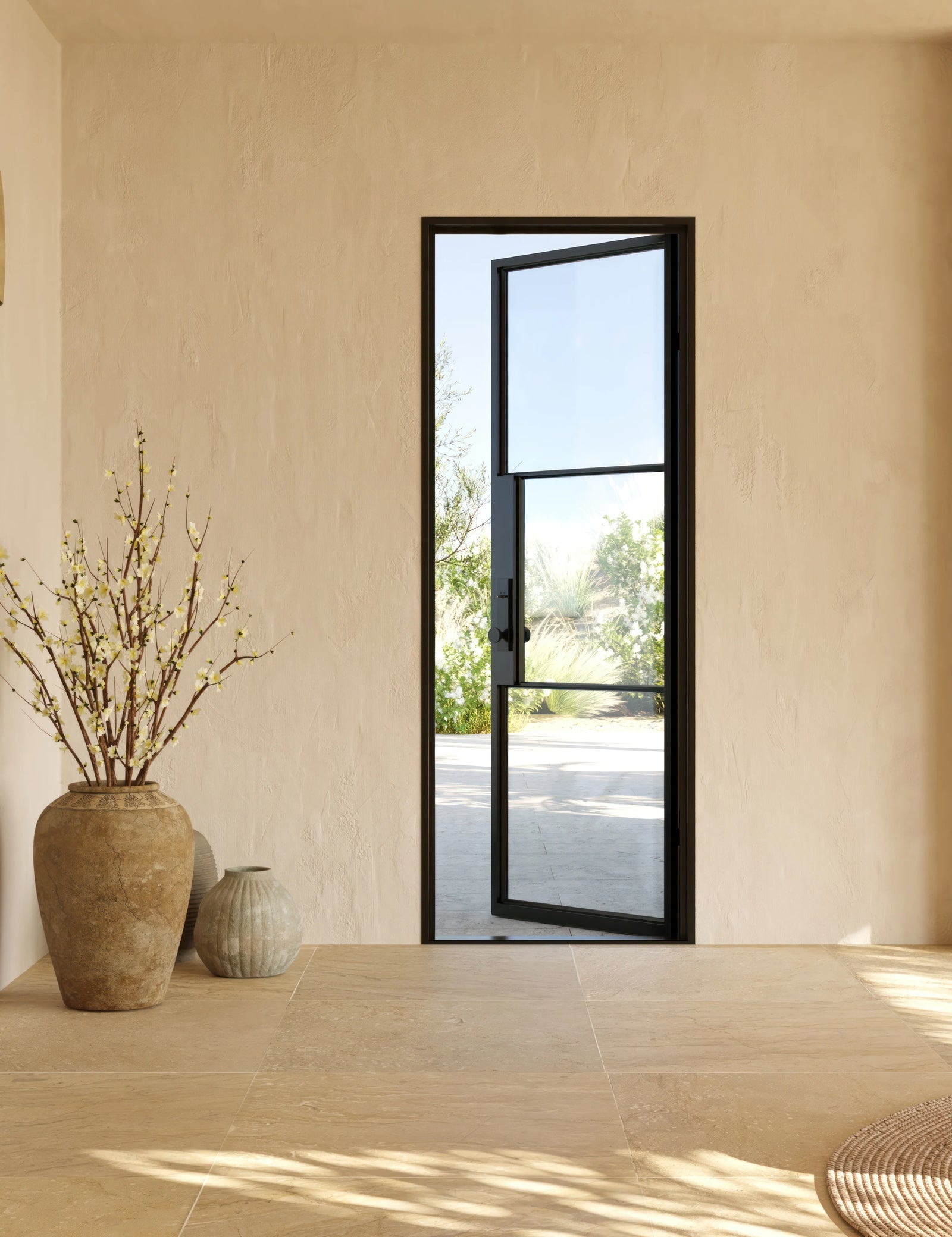 Air 4 flat single entry door in black steel with narrow sightlines