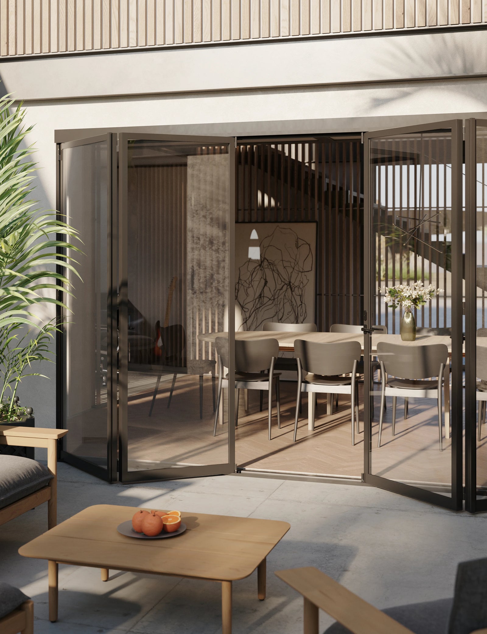Exterior center split bi-fold steel system with slim frames.