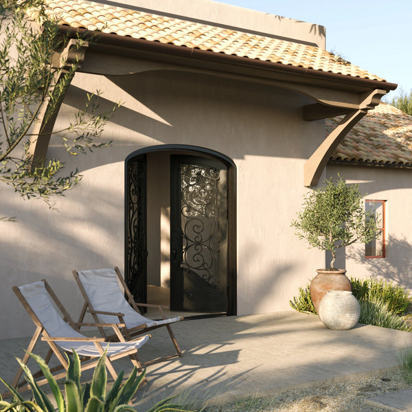 Beverly arched iron entry door with glass in bronze tone.