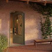 Golden Gate pre-hung black metal single arch top door with thick glass.