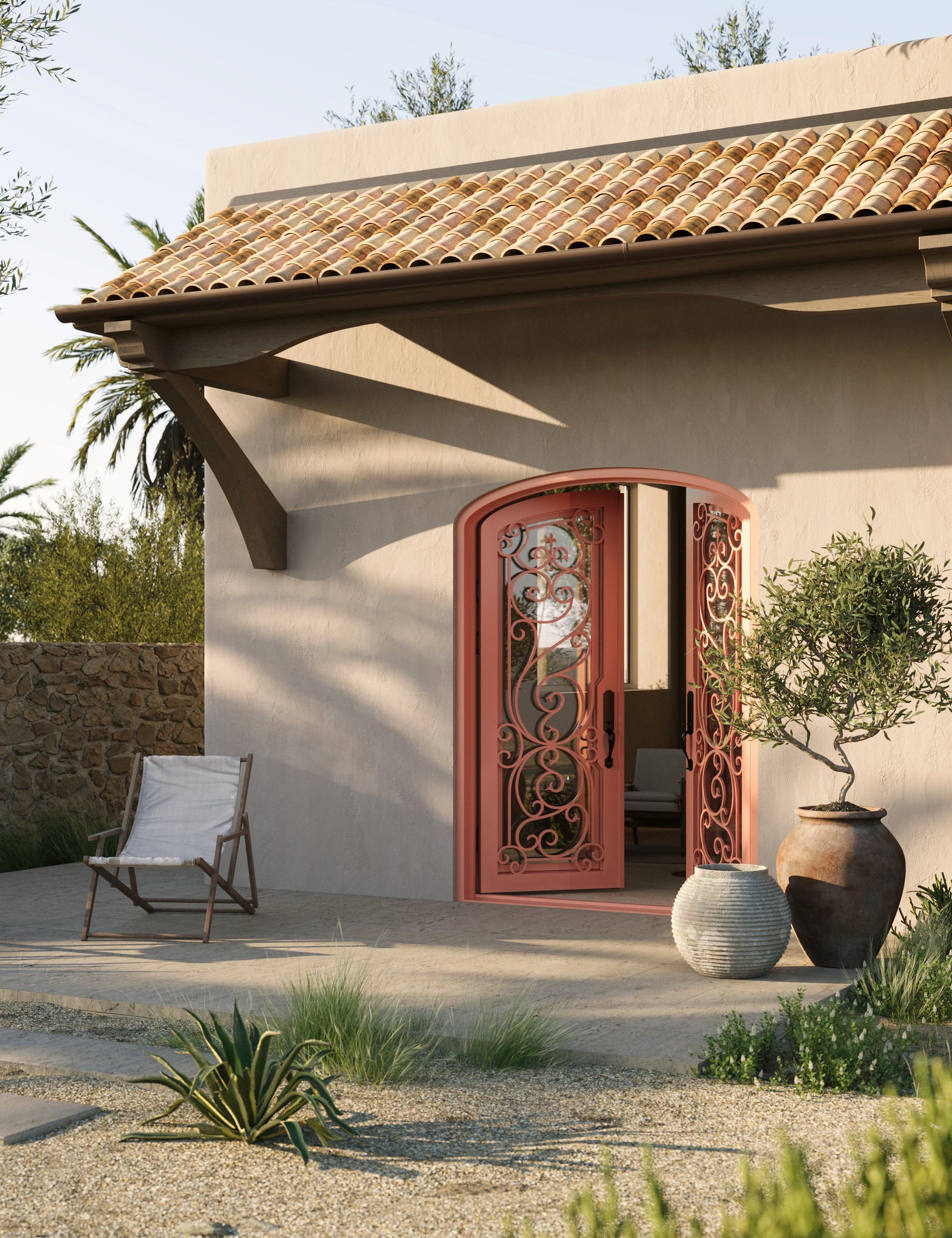Hills iron entry door in bronze hue with arch.