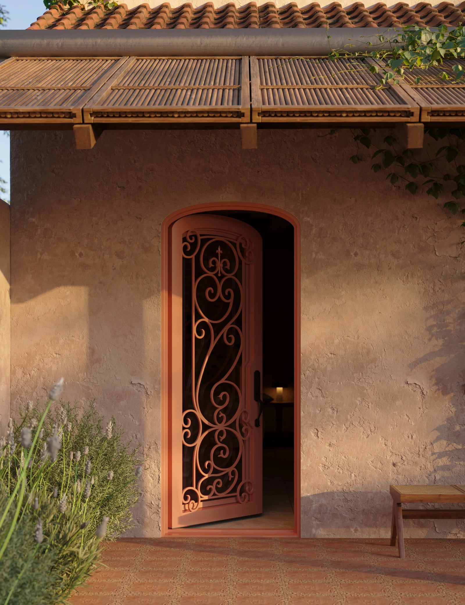 Hills single mini arch top iron swing door with decorative scrollwork and glass.