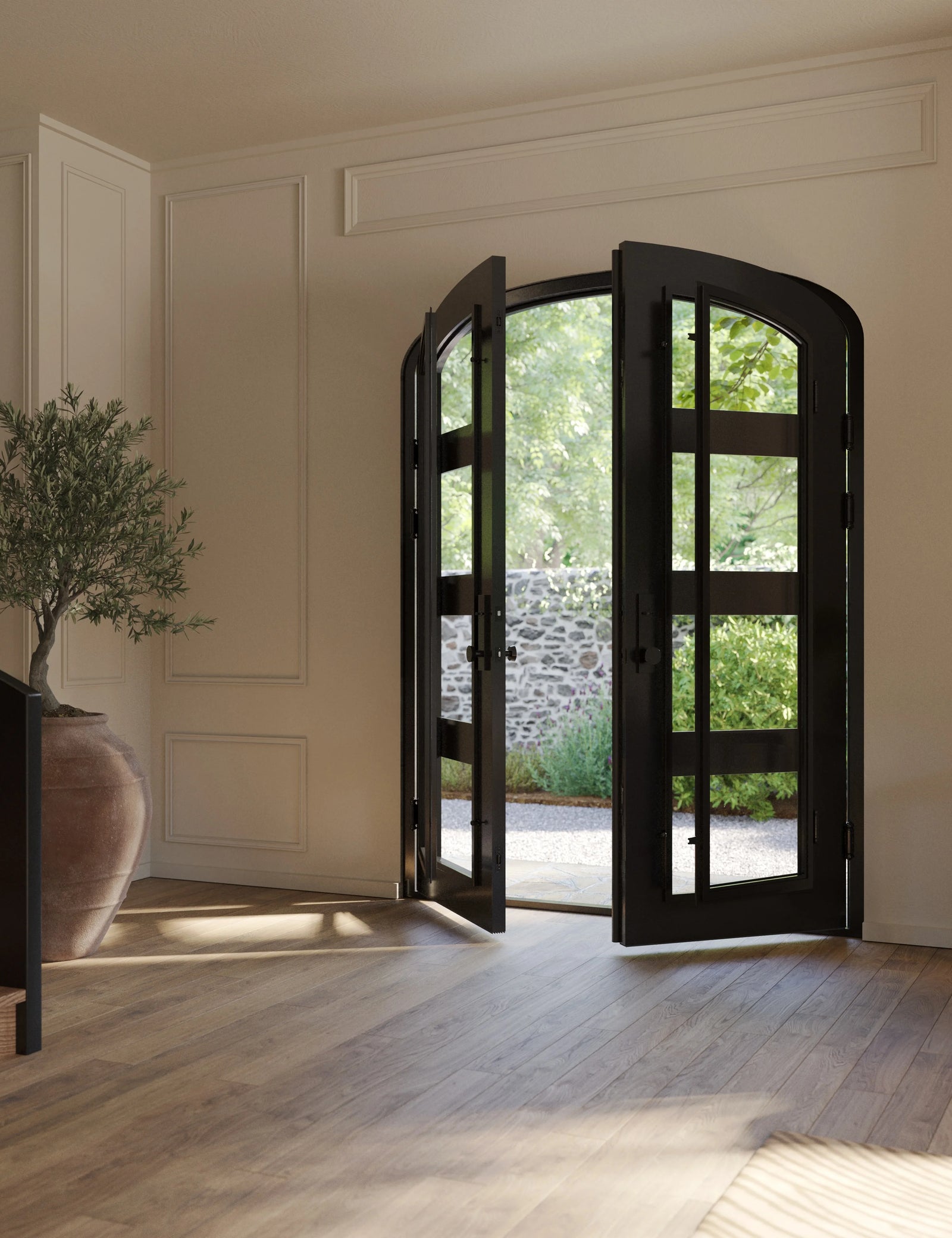 Knox iron double door with glass windows in bronze hue and arched top.