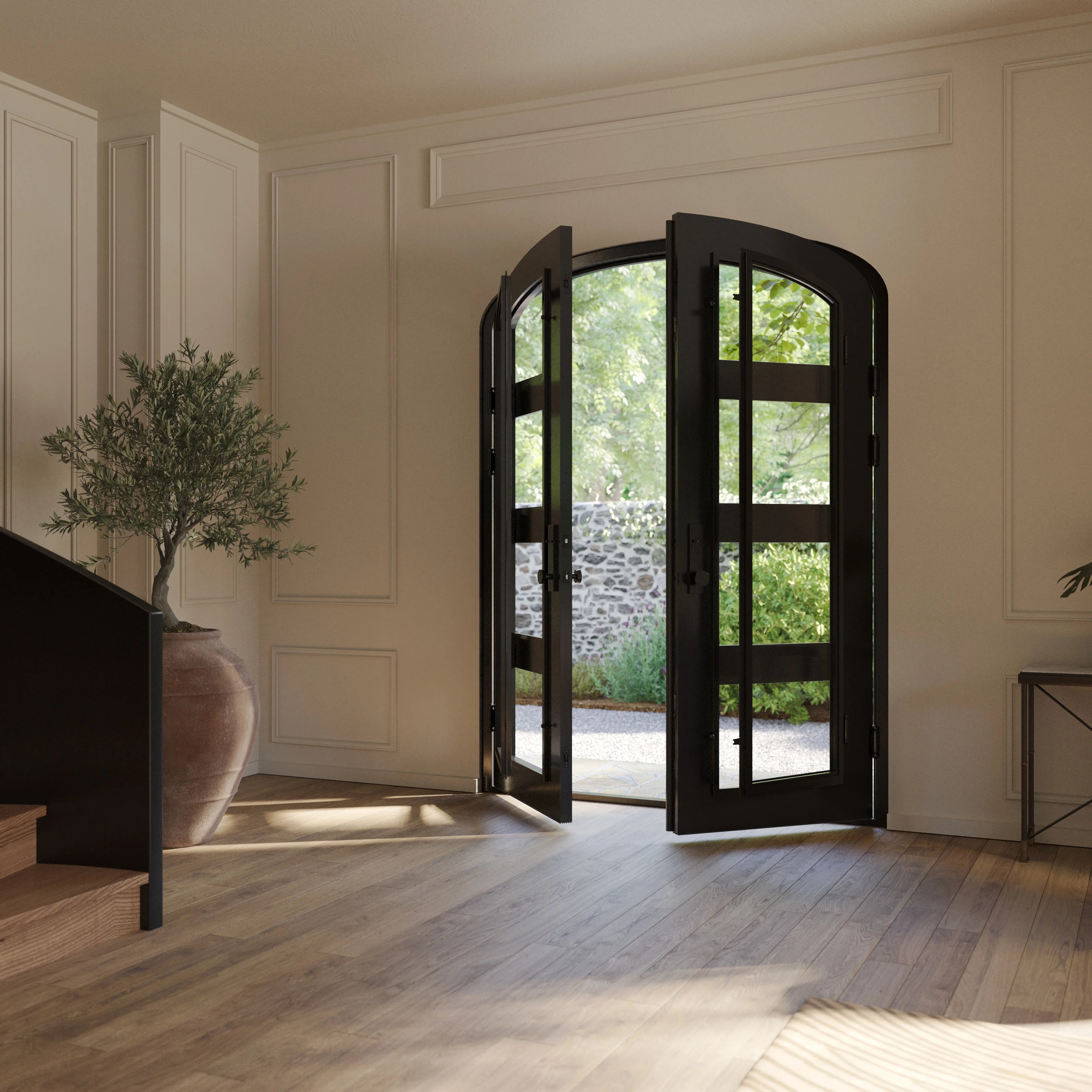 Knox iron double door with glass windows in bronze hue and arched top.