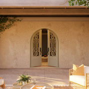 New York round top iron entry door for cold weather in bronze color.