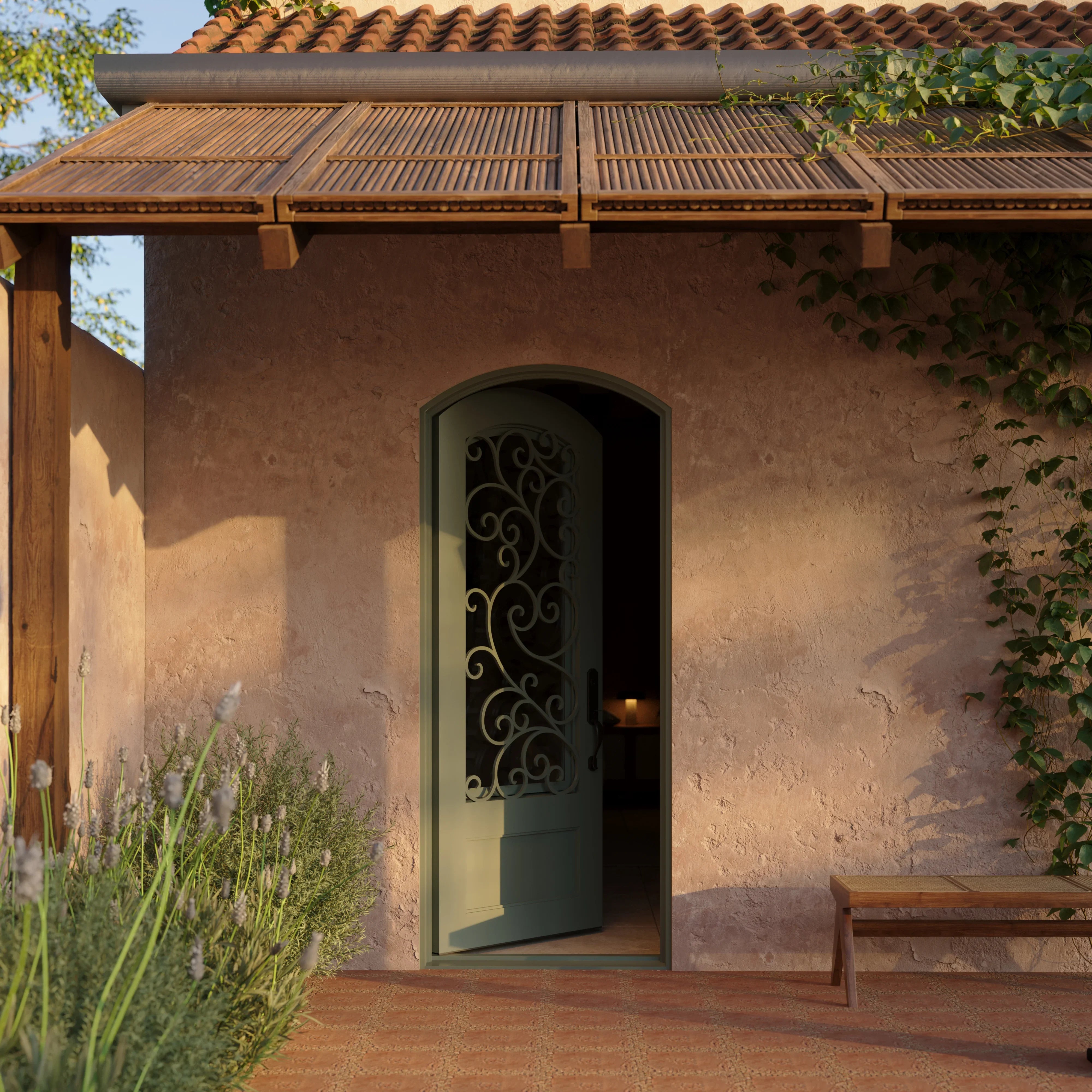 Story arch top single swing door with ornate metalwork and thermal break.