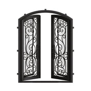 Hills iron entry door in bronze shade with clear glass and arched entry.