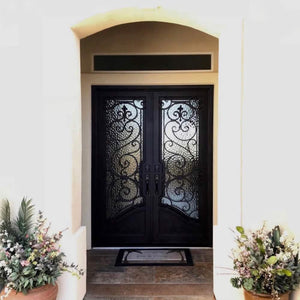 Flat top double iron entry doors in a family home