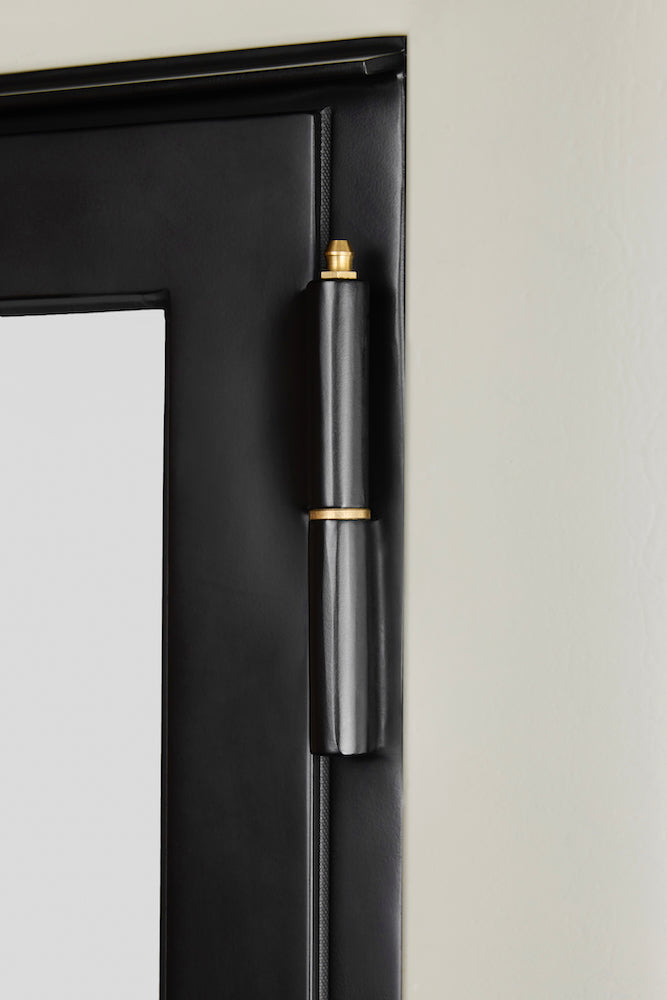 Closeup photo of a casement window hinge