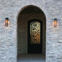 Load image into Gallery viewer, Classic style wrought iron door with glass pane in stone entryway