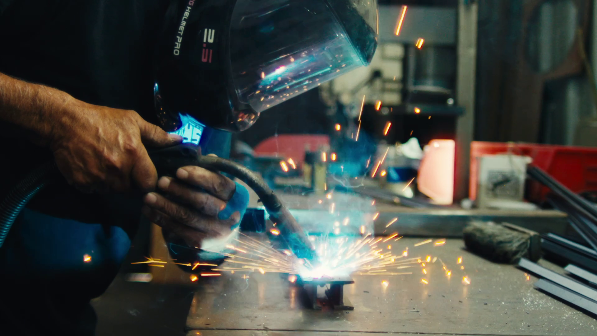 steel door maker welding a door frame
