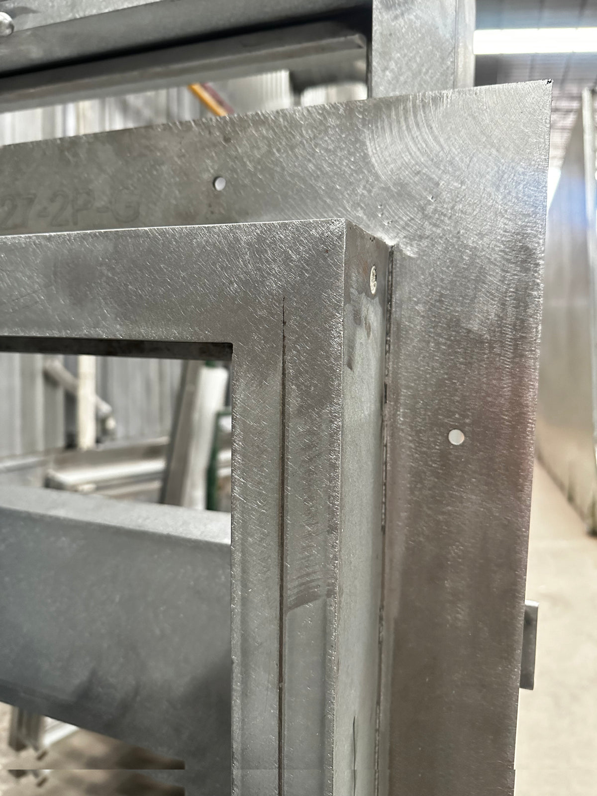 Macro Photo of a Nailer Fin on a Steel Window