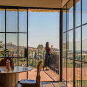 Air 5 exterior sliding steel door system with narrow sightlines and glass