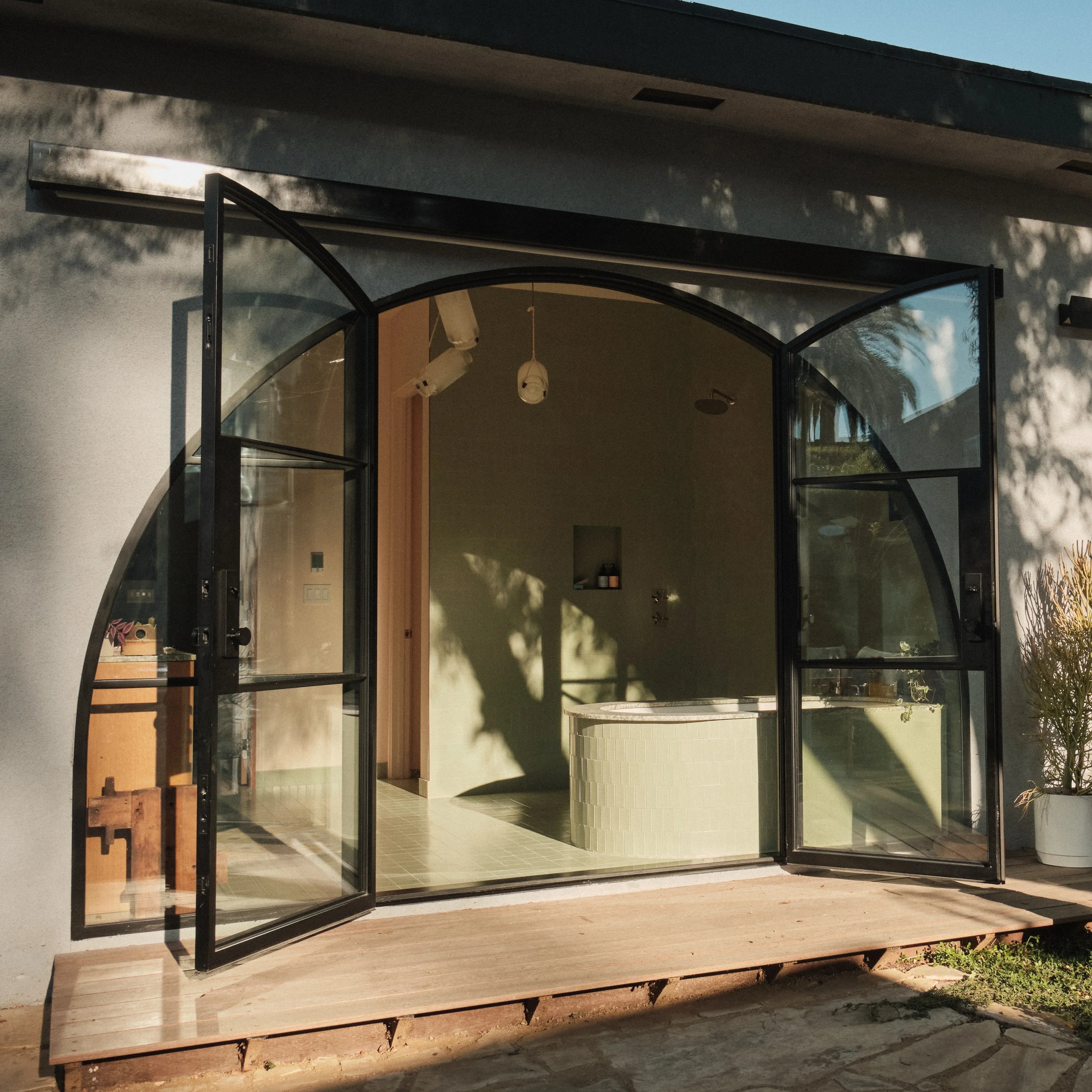 Air 4 wide full arch double entry doors with side windows and sleek steel lines