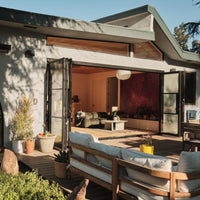 contemporary center opening folding steel door system